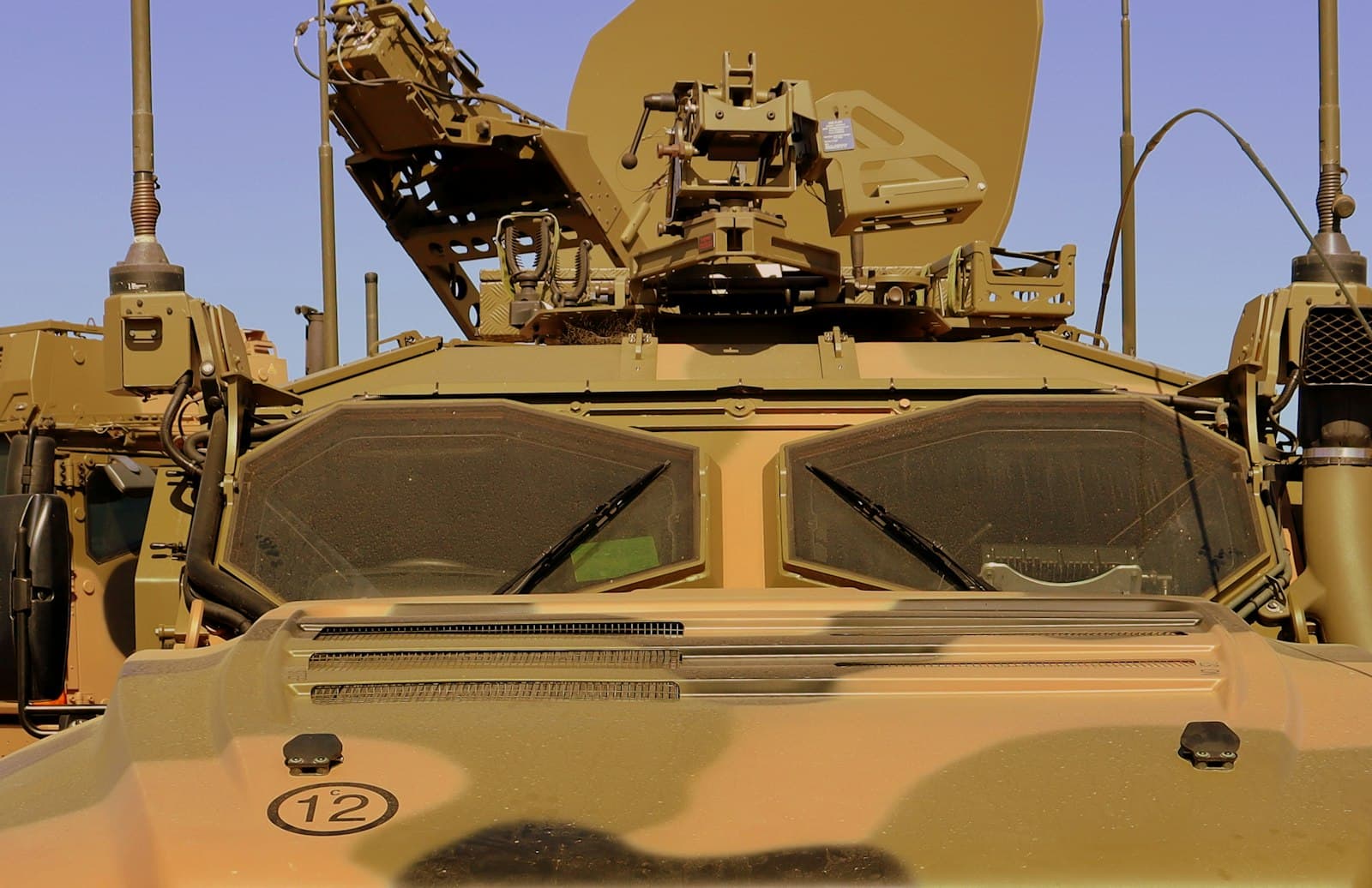 A military communications vehicle with a satellite dish