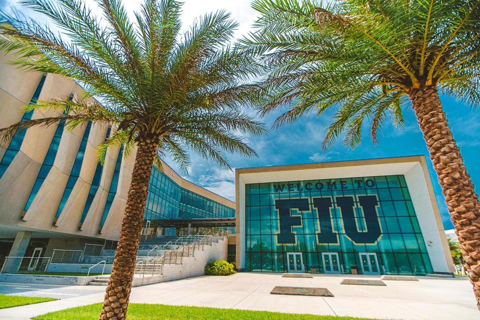 Florida International University welcome building framed by palm trees